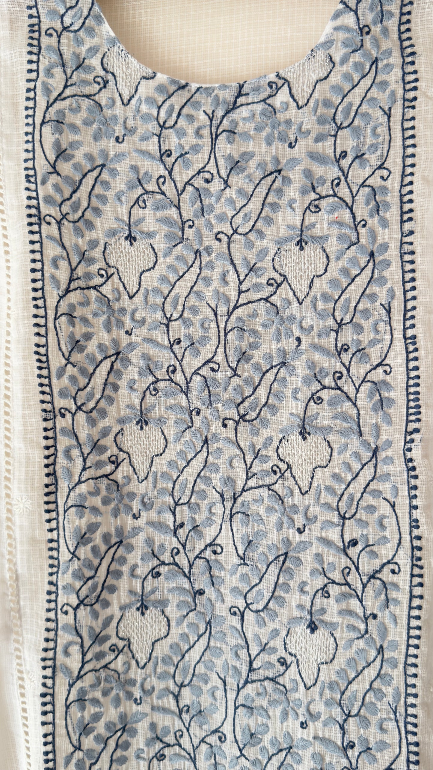 White kota kurta with Grey and blue Chikankari embroidery on the panel