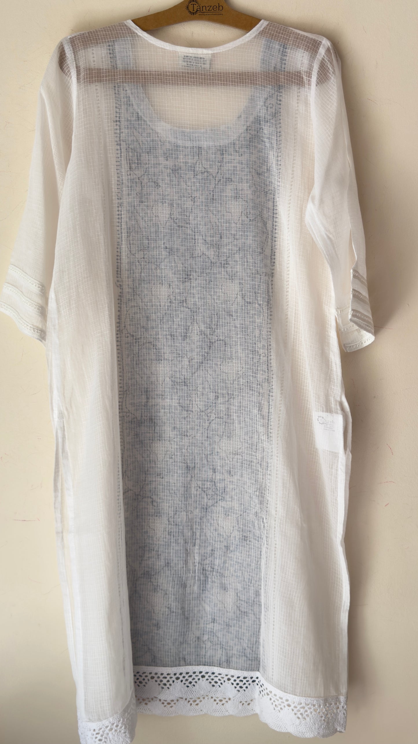 White kota kurta with Grey and blue Chikankari embroidery on the panel