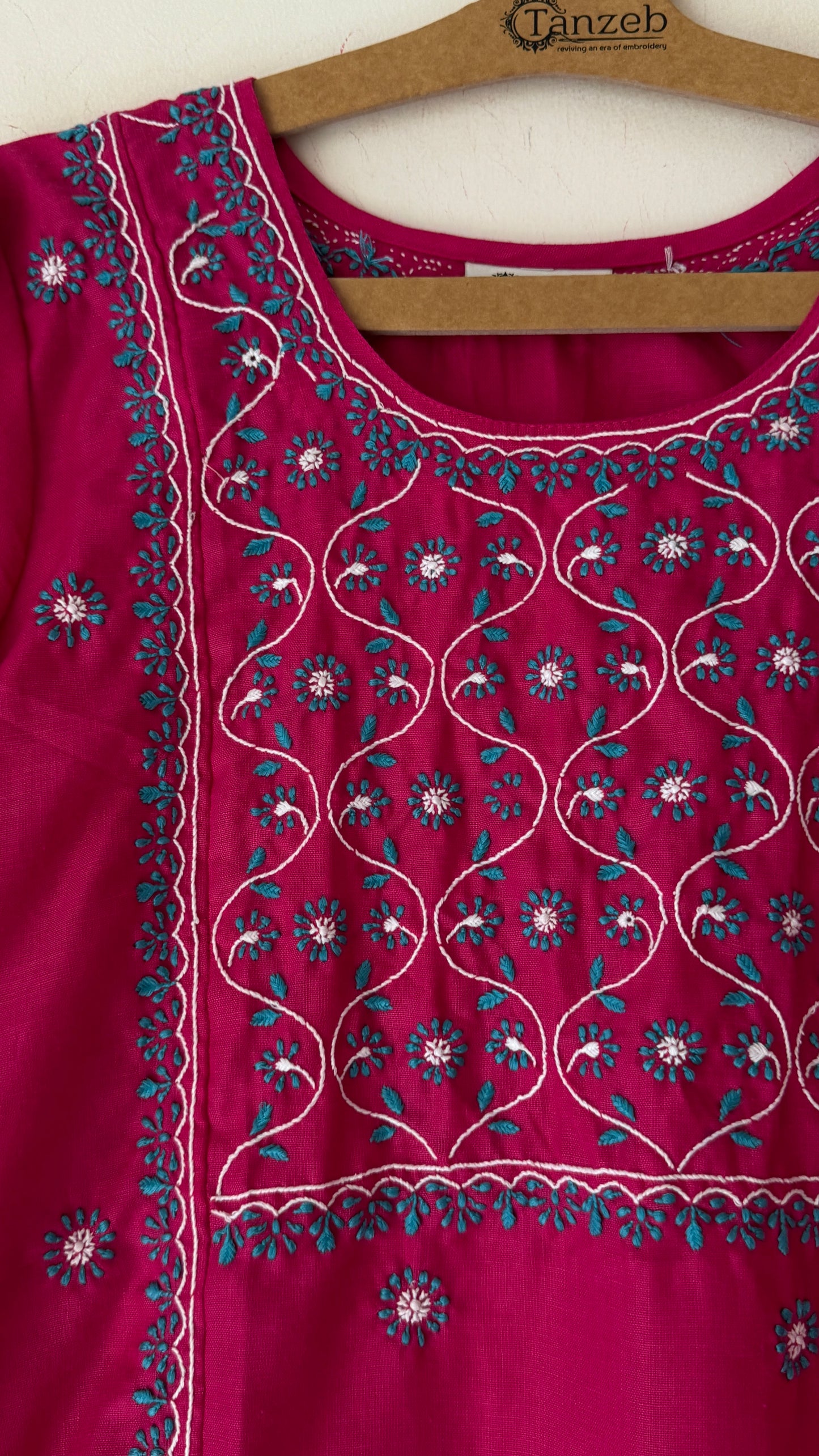 Rani pink terry mix with white and teal Chikankari embroidery on the kurta