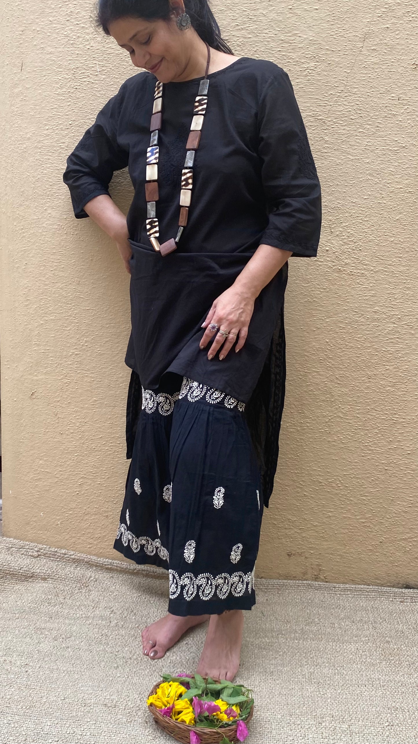 Black cotton sharara pants with white chikankari embroidery